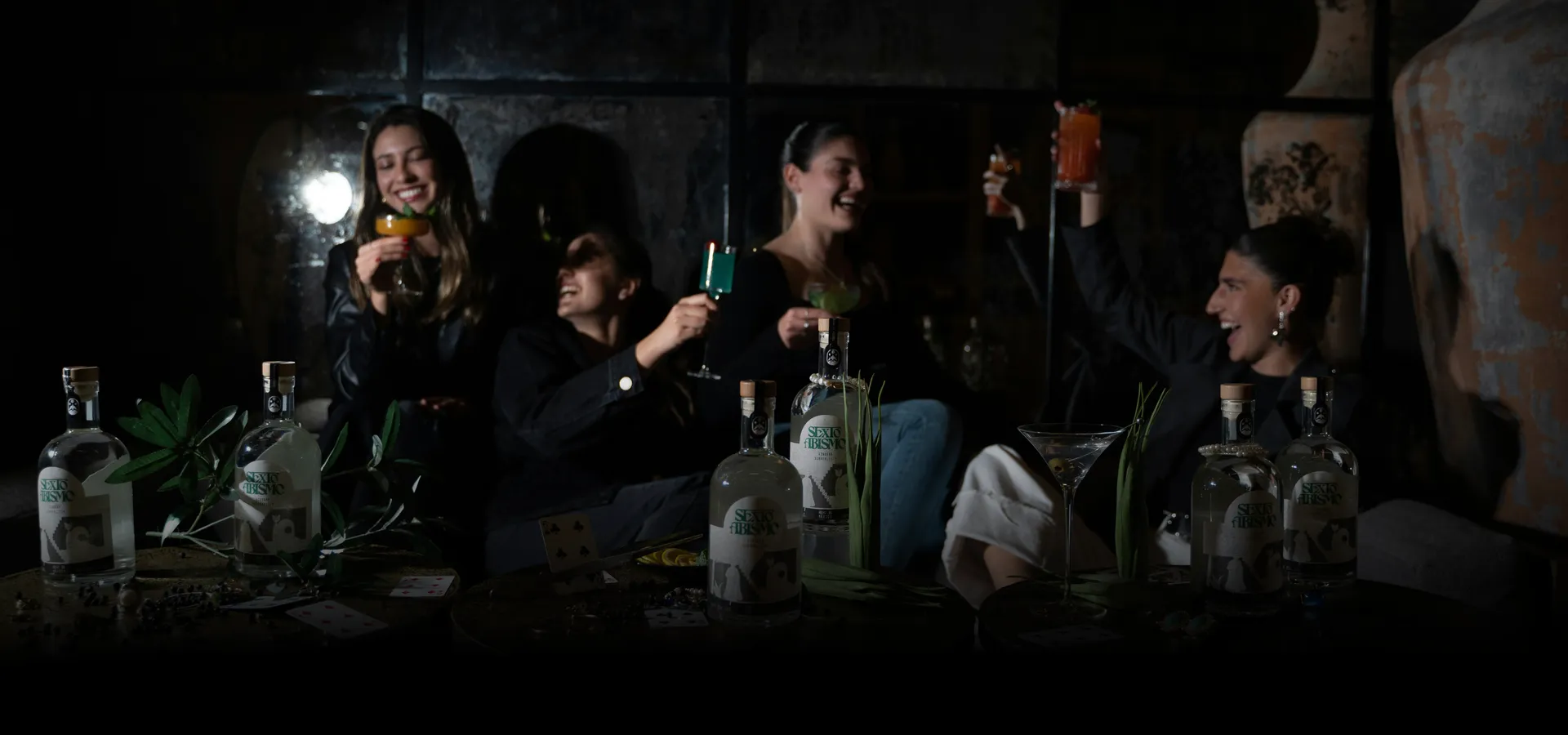 Guests enjoying signature cocktails at a lively event